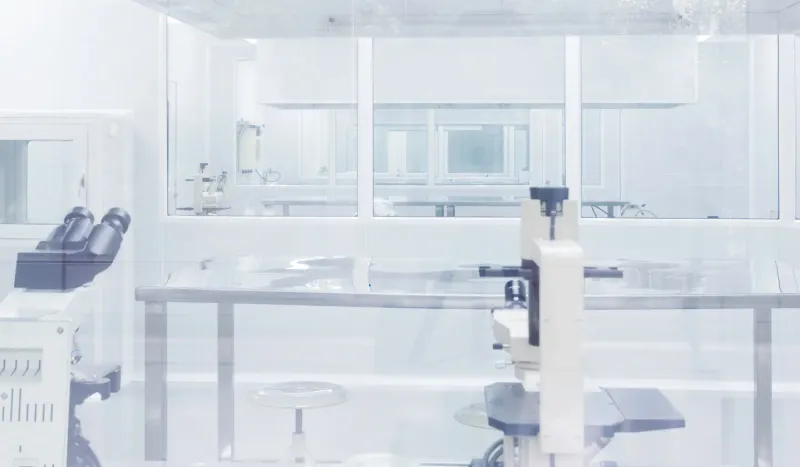 A cleanroom with stainless steel surfaces and controlled lighting